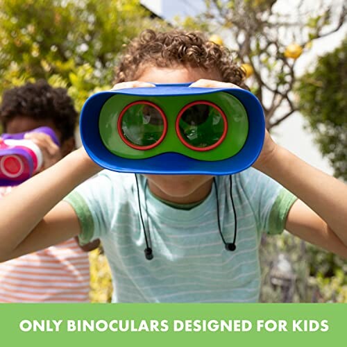 Children playing with colorful toy binoculars outdoors.