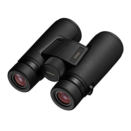 Black Nikon binoculars with red lenses.